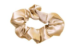 961 Golden cotton scrunchy isolated on a transparent background photo