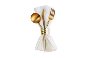 4900 Golden cutlery and white napkin isolated on a transparent background photo