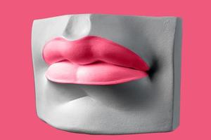 Plaster elements in a modern style. Lips in Viva magenta. Creative plaster figurine. photo