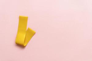 Sport, fitness equipment on pink background. Flat lay composition photo