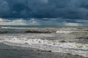 Dramati sky abnove sea near Rome, Italy photo