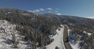 Orbiting shot of a mountain road outside of steamboat Springs video