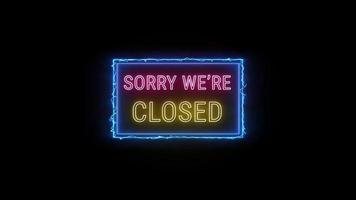 Es tut uns leid wurden geschlossen Neon- Gelb Rosa fluoreszierend Text Animation Licht Blau Rahmen auf schwarz Hintergrund video