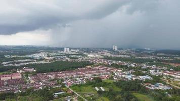 Drone shot hyperlapse move toward raining at rural residential town video