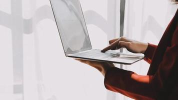 Financial analysts analyze business financial reports on a digital tablet planning investment project during a discussion at a meeting of corporate showing the results of their successful teamwork. video