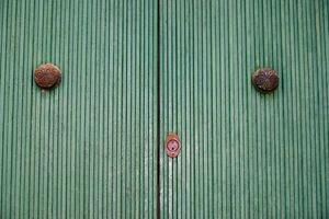 Old green painted wood door photo