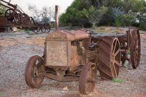 Old rusted antique tractor detail photo