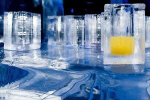ice blocks glasses in a ice hotel bar pub photo
