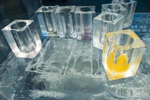 ice blocks glasses in a ice hotel bar pub photo