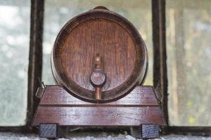Small wine Barrel in a cellar in Italy photo