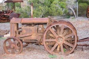 Old rusted antique tractor detail photo