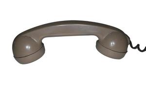 Old Telephone handset on white background photo