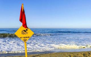 Red flag swimming prohibited high waves in Puerto Escondido Mexico. photo