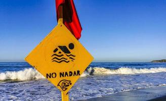 Red flag swimming prohibited high waves in Puerto Escondido Mexico. photo