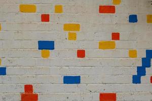 brick wall with coloured bricks photo