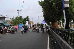 Tegal, December 2022. The atmosphere of the Tegal city square in the afternoon with many tourists visiting. photo