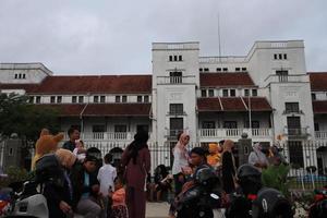 Tegal, December 2022. The atmosphere of the Tegal city square in the afternoon with many tourists visiting. photo