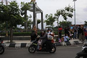 Tegal, December 2022. The atmosphere of the Tegal city square in the afternoon with many tourists visiting. photo