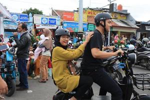 Tegal, December 2022. The atmosphere of the Tegal city square in the afternoon with many tourists visiting. photo