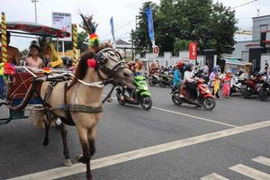 Tegal, December 2022. The atmosphere of the Tegal city square in the afternoon with many tourists visiting. photo