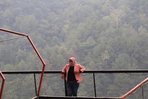 Kudus, December 2022. The atmosphere of visitors is enjoying the incandescent park tour with relaxing, beautiful and cool views photo