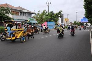 Tegal, December 2022. The atmosphere of the Tegal city square in the afternoon with many tourists visiting. photo