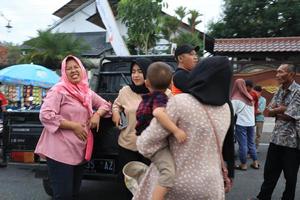 Tegal, December 2022. The atmosphere of the Tegal city square in the afternoon with many tourists visiting. photo