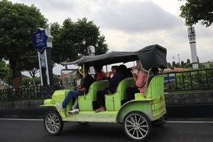 Tegal, December 2022. The atmosphere of the Tegal city square in the afternoon with many tourists visiting. photo