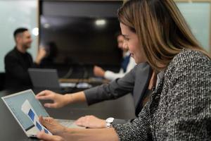 New business people in the conference room are exchanging information with each other along with rehearsing important information photo