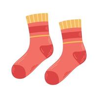 Vector cozy pair of red and yellow socks with ornaments. Knitted warm clothes. Woolen warm socks.