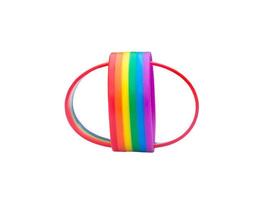 Two colorful rainbow wristband, lgbtq people symbol in strange shape isolated on white background with clipping path. Concept of lgbtq wristband wearing to support and attend celebration photo