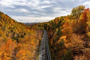 Aerial view of peak fall foliage in Keene, New York in upstate New York. photo