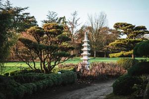 Japanese stone pagoda at a beautiful spring day photo