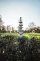 Japanese stone pagoda at a beautiful spring day photo