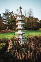 Japanese stone pagoda at a beautiful spring day photo