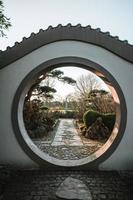 Moongate in a chinese garden photo