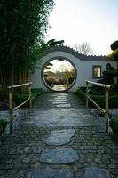 Moongate in a chinese garden photo