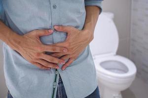 Men have contraction and stomach pain. diarrhea concept photo