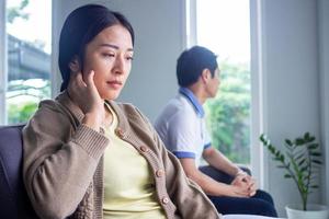 The woman felt depressed, upset and sad after fighting with her husband's bad behavior. Unhappy young wife bored with problems after marriage. photo