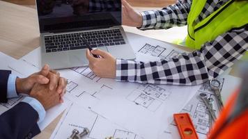 Picture of a meeting between the contractor and the owner of the construction project. Renovate of the new building structure photo