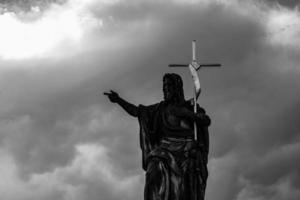 Historic Jesus on the old Prague Cemetery, Czech Republic photo