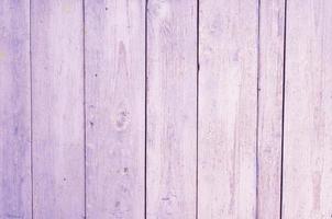 wooden vertical boards painted in lilac color. lilac wooden background photo