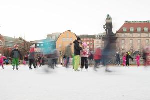 STOCKHOLM, SWEDEN - DECEMBER 29 2013, people while ice skating in stockholm main place photo