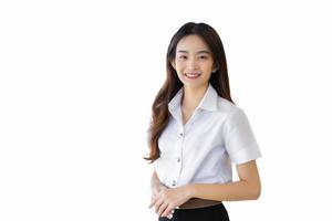 Asian Portrait of an adult Thai student in university student uniform. Young Asian beautiful girl standing confidently isolated on white background. photo