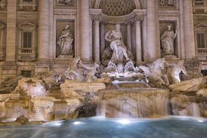 Night view of Fontana di Trevi fountain photo