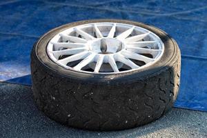 Racing car tire close up photo