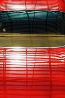 Red metal roof of a vintage retro car top view. photo