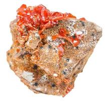 red vanadinite crystals on rock isolated photo