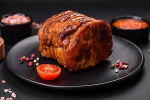 Delicious fresh smoked meat or ham with spices and herbs photo