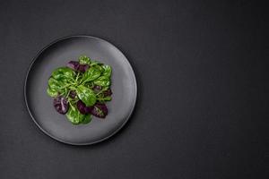 Delicious fresh salad consisting of spinach, chard, radicchio and red chart photo